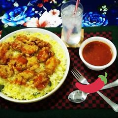 A picture of KFC Rice With Hot Shots n Garlic Sauce🍚🍲😋.