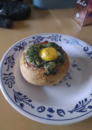 A picture of Creamed spinach and egg bread bowl.