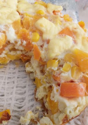 Una foto de "Budín" de calabaza y zanahorias
