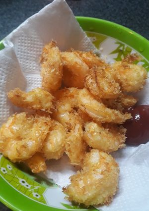 Una foto de Camarones apanados