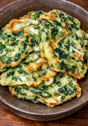 Una foto de 🌿 Bocadillos de acelga en airfryer