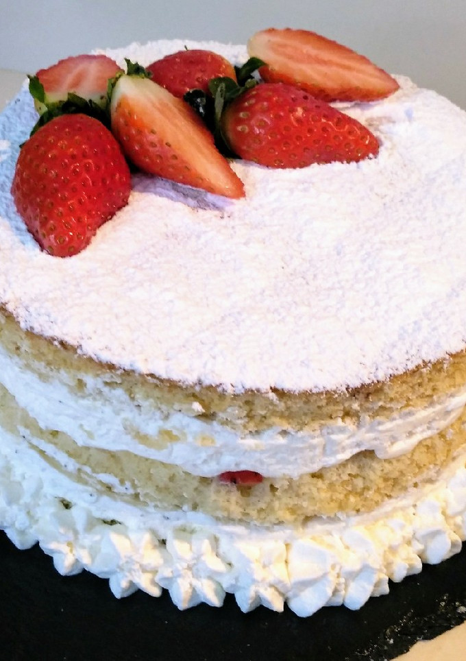 Una foto de Tarta de fresas con nata
