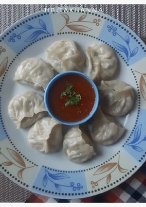 A picture of Veg Momo - Palak, Paneer and Cheese Momo.