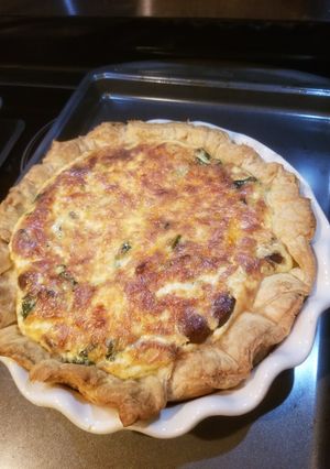 A picture of Mushroom, carmelized onion, spinach, and gruyere quiche.