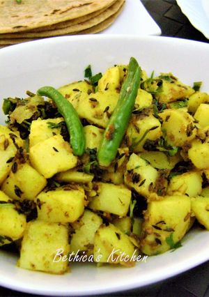 A picture of Jeera Aloo (Potatoes Tempered with Cumin seeds).