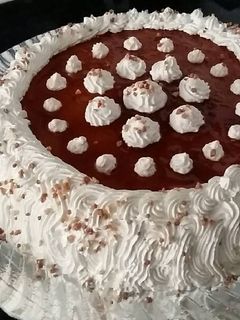 Una foto de Tarta tocino de cielo nata y crocantis