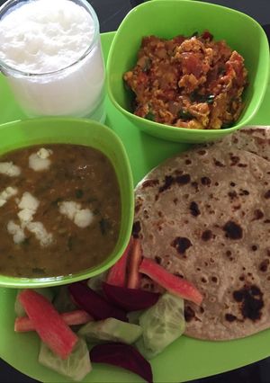 A picture of #Lunch#Paneer Bhurjee with green whole moong dal and chapattis.