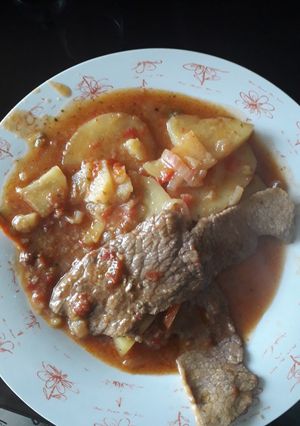 Una foto de Bifes a la criolla
