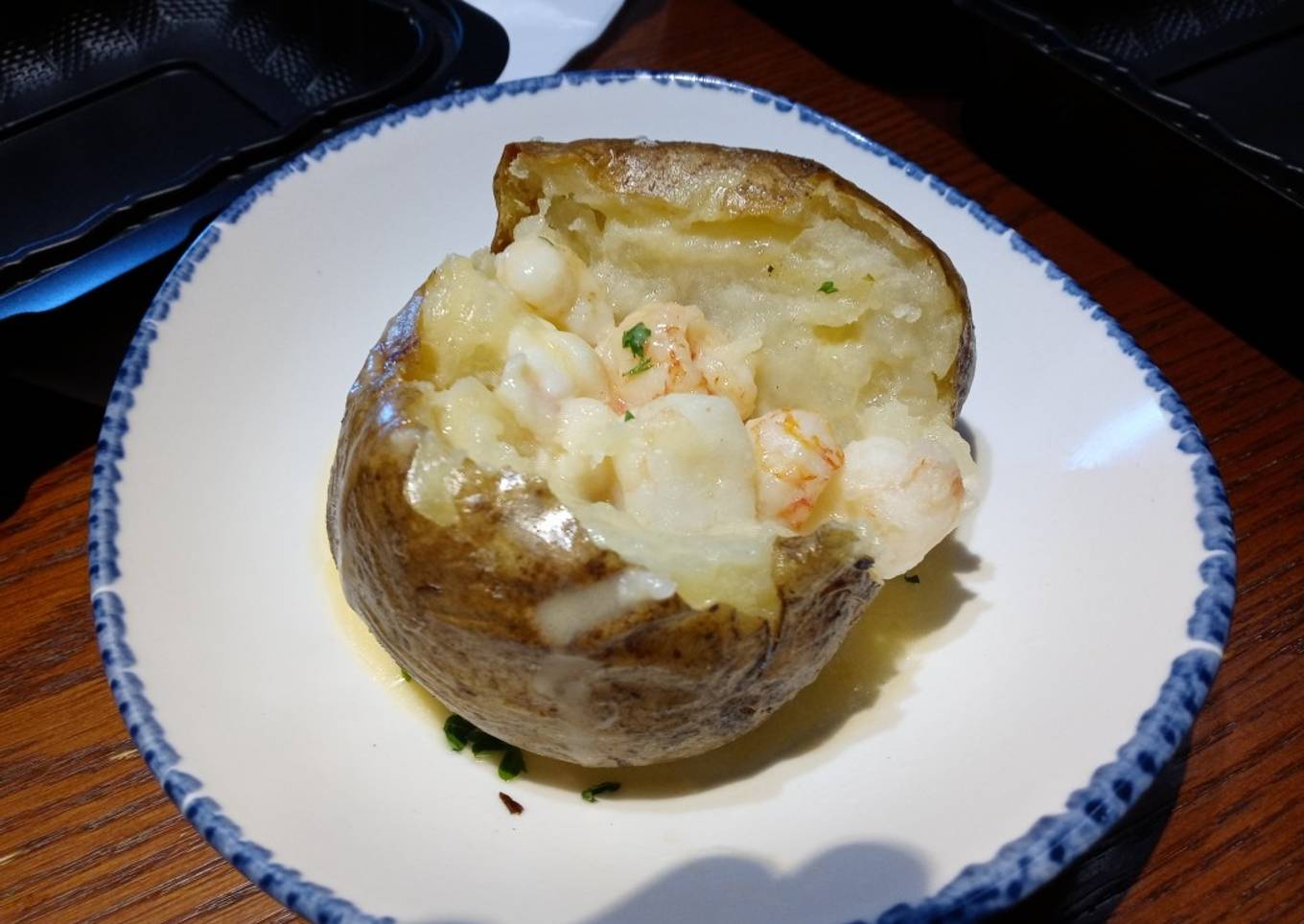 Baked potato stuffed with shrimp and lobster