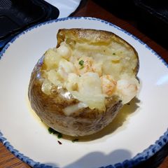 A picture of Shrimp and Lobster Stuffed Baked Potato.