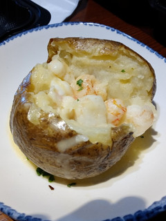 A picture of Shrimp and Lobster Stuffed Baked Potato.