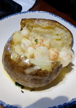 A picture of Shrimp and Lobster Stuffed Baked Potato.