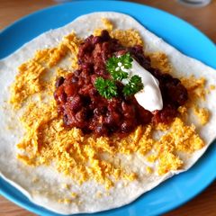 A picture of Bean chilli with toasted sweetcorn mash.