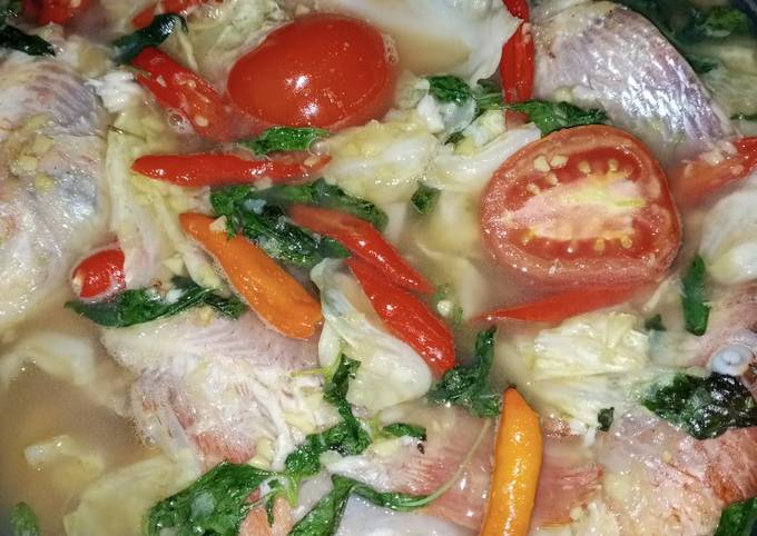 Ikan patin yang telah dimasak dalam kuah asam pedas