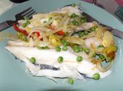 Una foto de filete de dorada