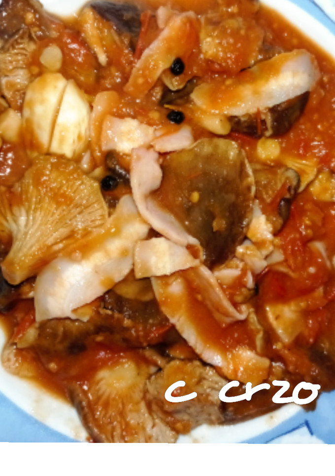 Una foto de Setas en conserva con tomate y bacon