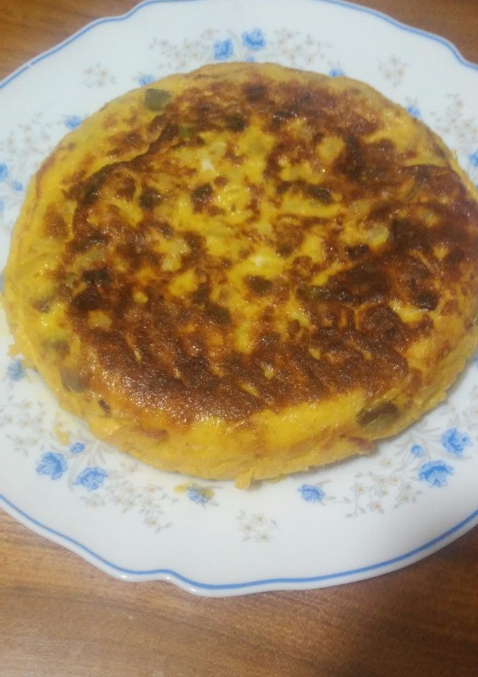Una foto de Tortilla de patata paisana