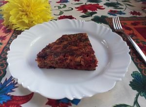 Una foto de Tortilla zapallito, repollo y más