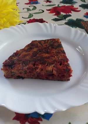 Una foto de Tortilla zapallito, repollo y más