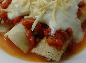 Una foto de Canelones a la Rossini