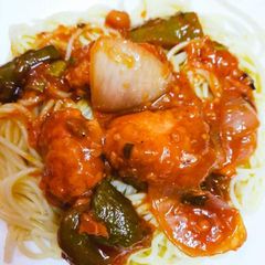 A picture of Noodles with Chicken sauce.