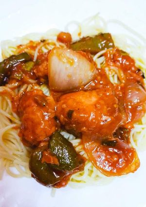 A picture of Noodles with Chicken sauce.
