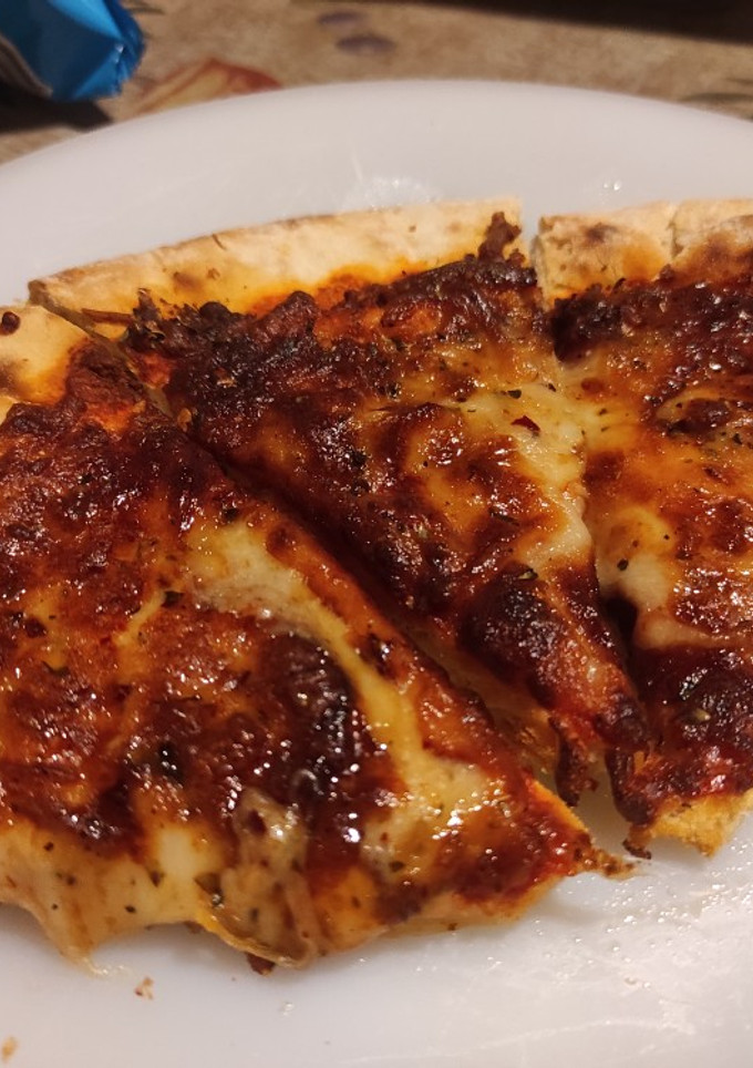 Una foto de Pizza 4 quesos