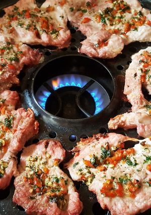 Una foto de Cerdo a la parrigas