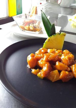 Una foto de Pollo agridulce estilo oriental