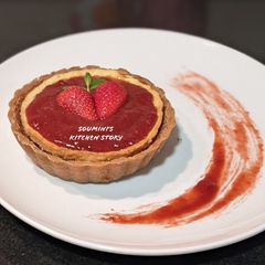 Cheesecake Tart with strawberry compote A picture of Cheesecake Tart with strawberry compote.
