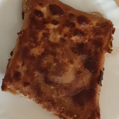 A picture of Envelop paratha breakfast.