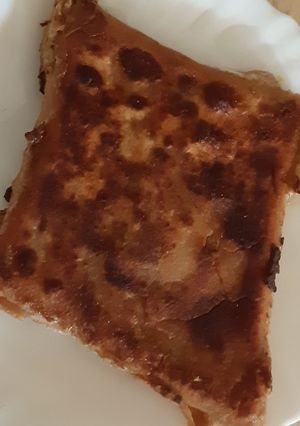 A picture of Envelop paratha breakfast.