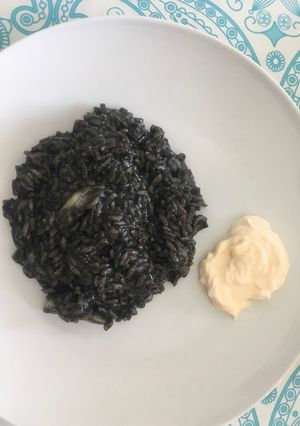 A picture of Black Rice with Cuttlefish or Baby Squid.