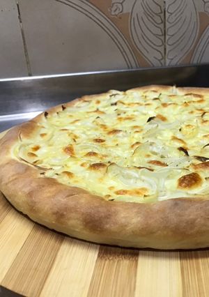 Una foto de Variedades de pizza: Fugazetta