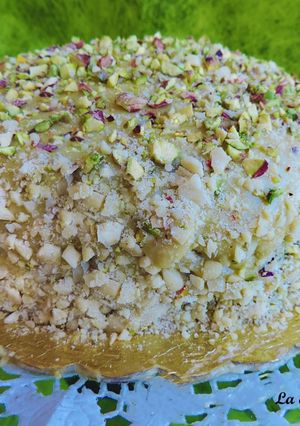 Foto di Torta al cacao con crema e glassa al pistacchio (Babbi)