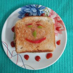 A picture of Vegetable cheese sandwich for kids.