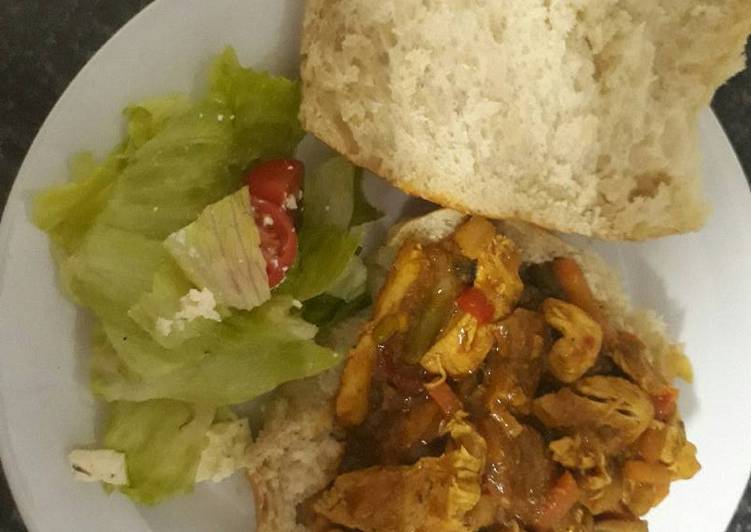 Chicken stir fry, panini bread with green salad