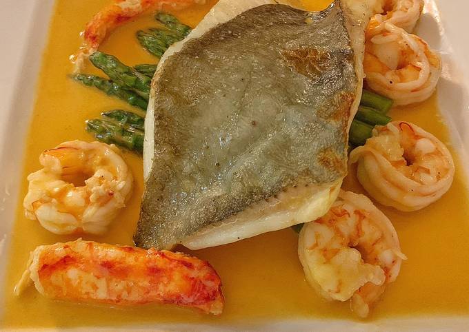 A fillet of John Dory with Alaskan crab and asparagus