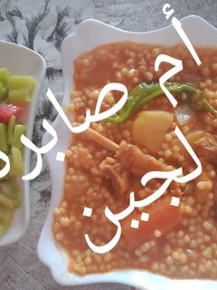 صورة لوصفة عيش حار بالقديد (الخليع)😋 مع سلطة فلفل مخلل 😋