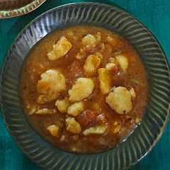 A picture of Aloo Masala Curry/ Aloo Tomato Jhol Without Onion Garlic.