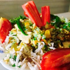 Mix veg briyani with grated coconut A picture of Mix veg briyani with grated coconut.