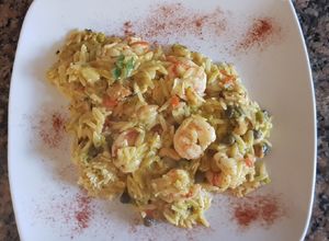 Una foto de Orzo, con langostinos y mejillones