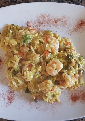 Una foto de Orzo, con langostinos y mejillones