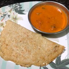 A picture of Murmura(Puffed Rice) Dosa with Tomato Chutney.