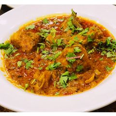 A picture of Nuts gravy chicken/shahi murgh masala.