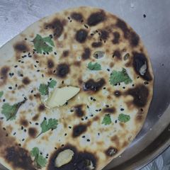 A picture of Stuffed & fluffy Kulcha.