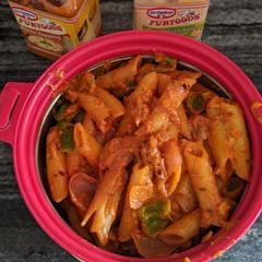 A picture of Red penne pasta.