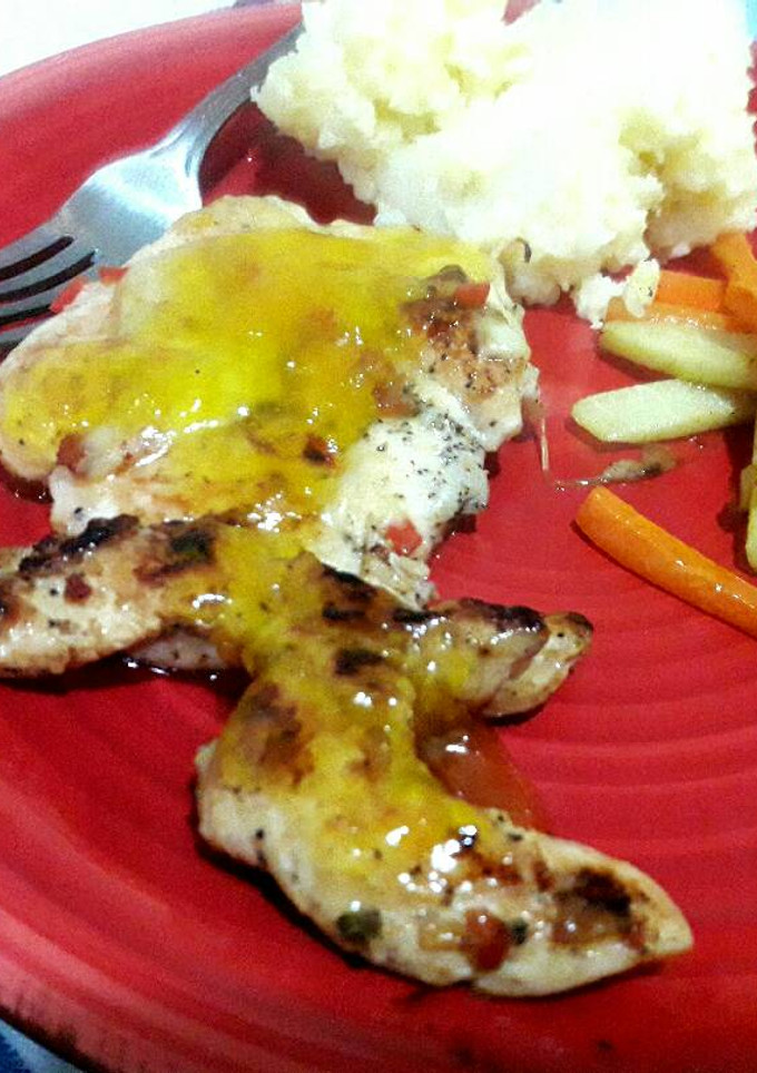 Una foto de Pollo en salsa de piña