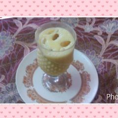 A picture of Banana shake with ice cream.