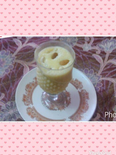 A picture of Banana shake with ice cream.